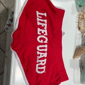 Red lifeguard shorts